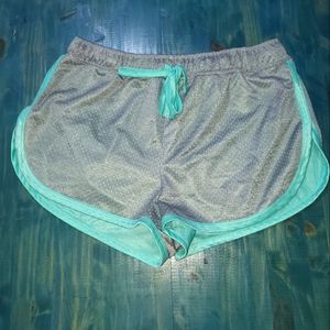 Silver / grey athletic shorts with aqua trim Large